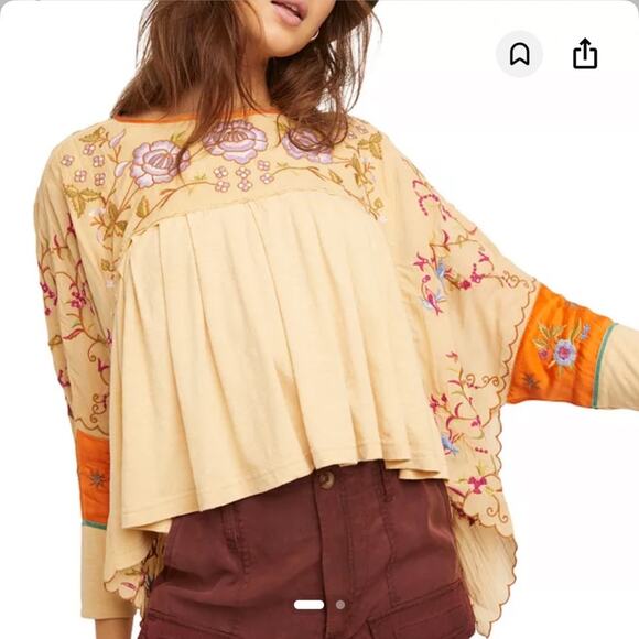 Free People Tops - Free People NWOT Waiting on a Sunny Day Top with embroidered Flowers details.